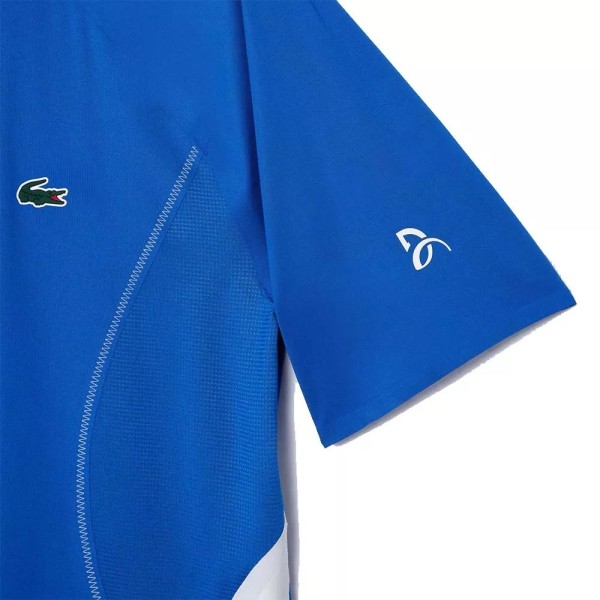 Polo Blu da Tennis Melbourne di Lacoste Novak Djokovic | Ipontennis